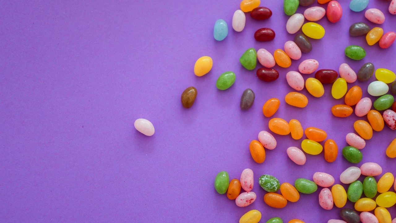 jelly beans on purple background