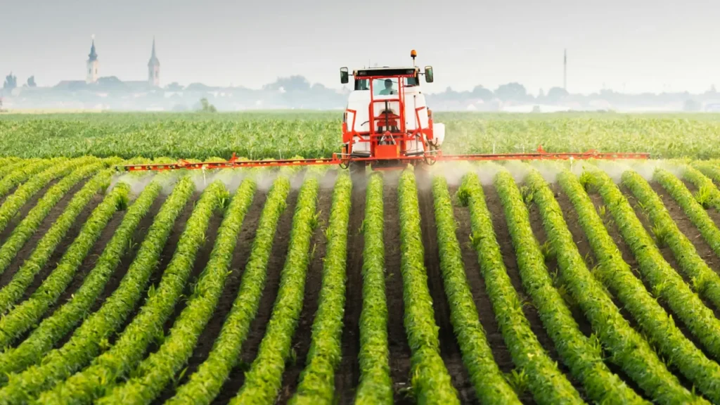 tractor spraying pesticides