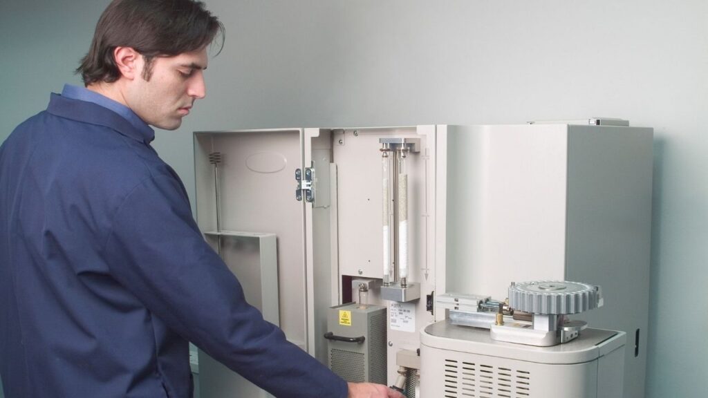 Man working on Truspec instrument