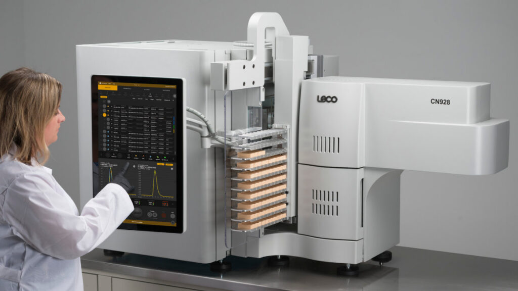 Laboratory technician using LECO 928 Series carbon and nitrogen analyzer