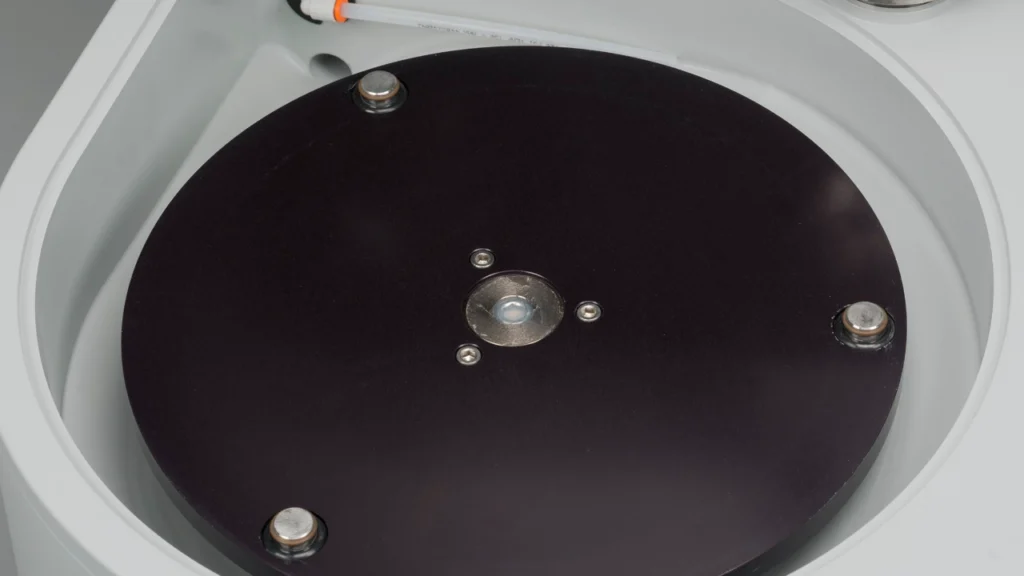 coolant basin on metallography grinder-polisher