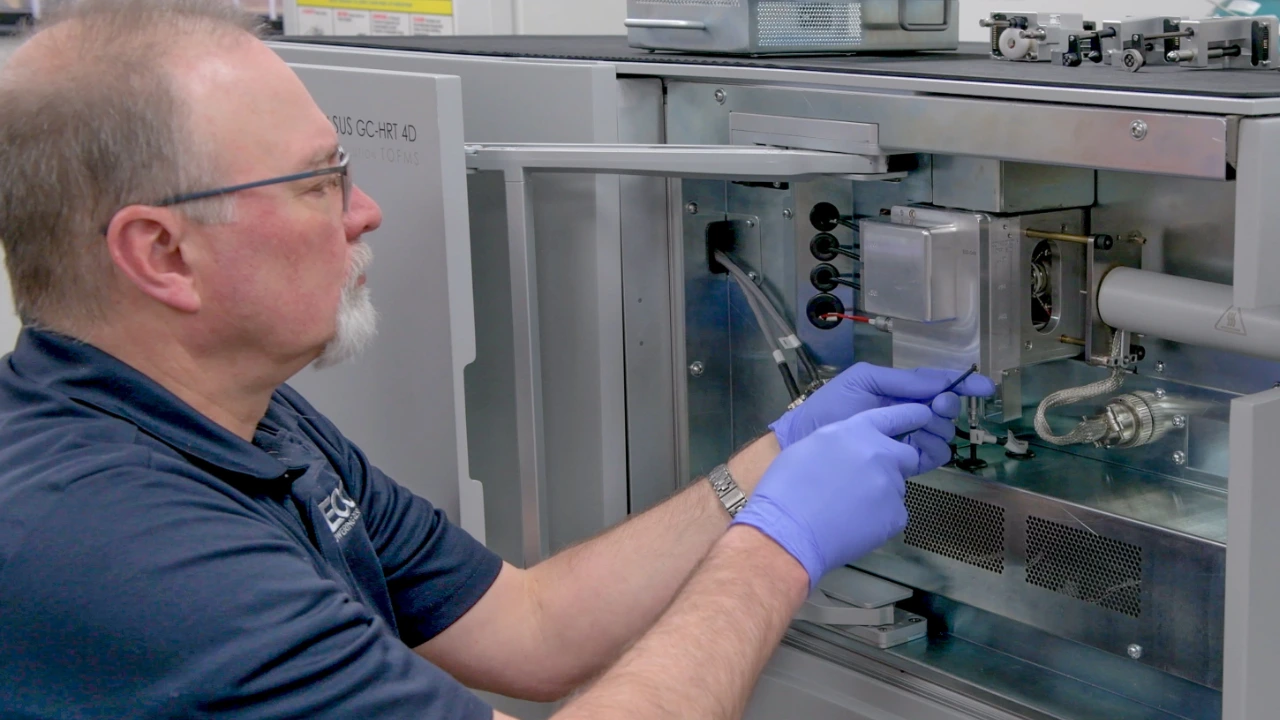 LECO service technician repairing instrument